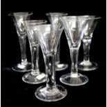 A COLLECTION OF SIX VICTORIAN PENNY LICK ILLUSION GLASSES Each having a shallow bowls and circular