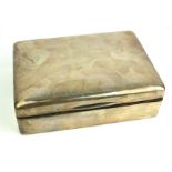 AN EARLY 20TH CENTURY PLAIN SILVER RECTANGULAR CIGARETTE BOX With fitted wood lined interior,