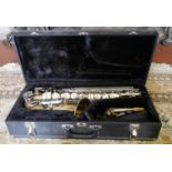 A VINTAGE CASED 'BEACON' SAXOPHONE With brass finish, mother of pearl buttons and separate