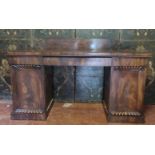 A WILLIAM IV MAHOGANY TWIN PEDESTAL SIDEBOARD With cartouche back rail above drawers and