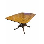 IN THE MANNER OF GEORGE BULLOCK, A REGENCY PERIOD MAHOGANY BREAKFAST TABLE Having an ebony and brass