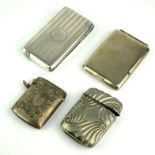 TWO EARLY 20TH CENTURY SILVER VESTA CASES The rectangular case with engine turned decoration,