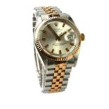 ROLEX, DATEJUST, A STAINLESS STEEL AND 18CT ROSE GOLD GENT'S WRISTWATCH Having an 18ct gold bezel