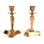 ARTS & CRAFTS, A PAIR OF LATE 19TH CENTURY PERIOD CAST BRONZE DESK CANDLESTICKS With tapering reeded