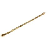 A 9CT GOLD AND DIAMOND BRACELET Oval links with diamond set spacers. (approx 20cm)