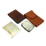 TWO EARLY 20TH CENTURY SILVER CIGARETTE CASES Including a rectangular case with 9ct gold plated