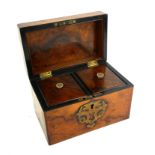 A VICTORIAN WALNUT AND BRASS RECTANGULAR TEA CADDY With pierced brass panel to lid and escutcheon,