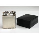 DUNHILL, AN EARLY 20TH CENTURY SILVER SQUARE LIFT ARM LIGHTER With engine turned decoration, pat