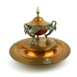 A 19TH CENTURY BRONZE CIRCULAR INKWELL With classical masks and eagle supports to centre, together