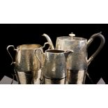 A VICTORIAN SILVER THREE PIECE OVAL TEA SET With ivory finial and fine engraved fern decoration,