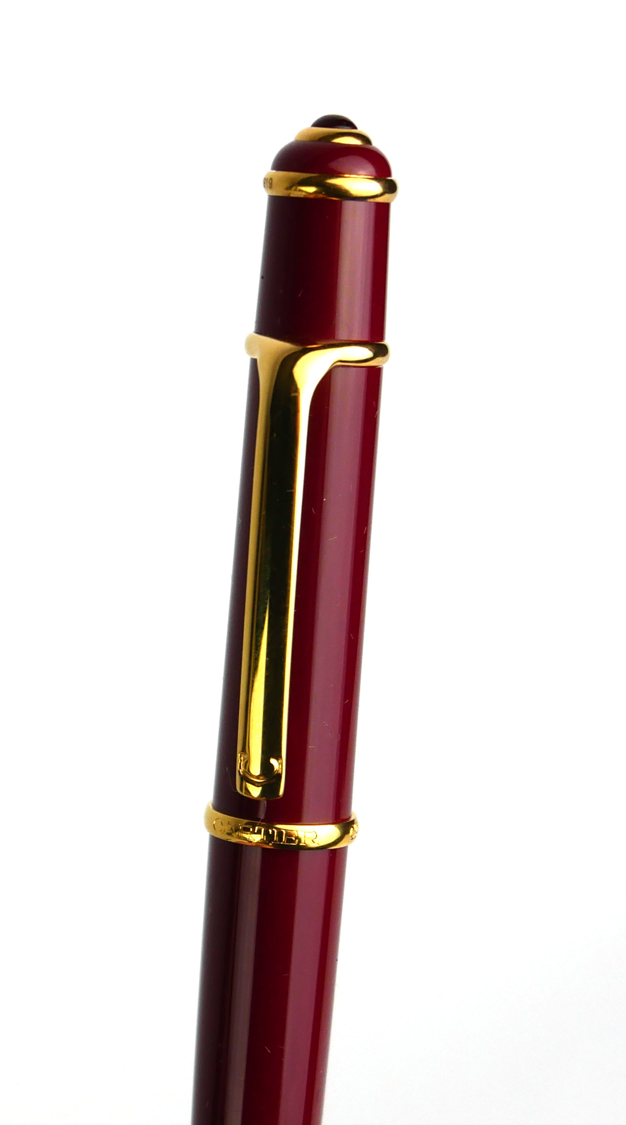 CARTIER, A VINTAGE BALLPOINT PEN Rouge case with gold plated clip, in a fitted Cartier box. ( - Image 3 of 4