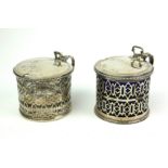 A MATCHED PAIR OF VICTORIAN SILVER AND GLASS CIRCULAR MUSTARD POTS Having a single handle, beaded