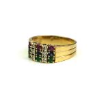 A FRENCH 18CT GOLD, DIAMOND AND GEM SET RING The row of rubies, sapphires and emeralds, interspersed