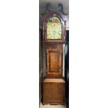A 19TH CENTURY EIGHT DAY NORTH COUNTRY OAK AND MAHOGANY LONGCASE CLOCK Having a painted arched dial,