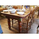 R. STEVENS AND SONS, AN EDWARDIAN MAHOGANY SNOOKER DINING TABLE With extra leaves enclosing a