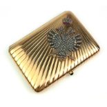 AN EARLY 20TH CENTURY RUSSIAN 14CT GOLD, DIAMOND AND RUBY RECTANGULAR CIGARETTE CASE With applied