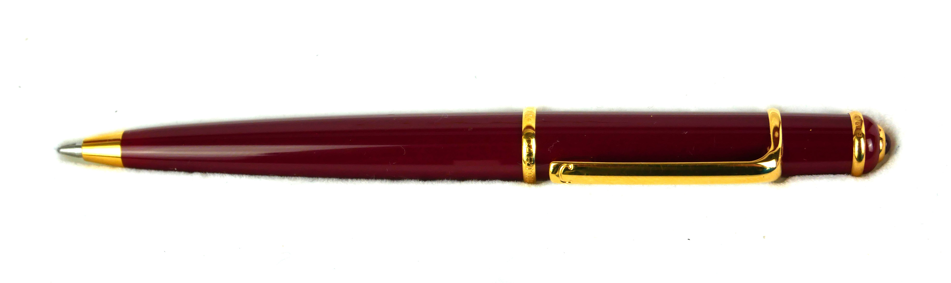 CARTIER, A VINTAGE BALLPOINT PEN Rouge case with gold plated clip, in a fitted Cartier box. ( - Image 2 of 4