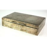 A MID 20TH CENTURY SILVER RECTANGULAR CIGARETTE BOX With engraved decoration, hallmarked Mappin