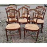 A SET OF EIGHT INCLUDING TWO CARVERS 19TH CENTURY FRENCH STYLE ELM AND BEECHWOOD COMB BACK DINING