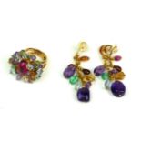A FRENCH 18CT GOLD AND GEM SET 'TUTTI FRUTTI' RING AND EARRINGS SET The ring having a oval cut stone