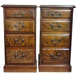 A PAIR OF EARLY 20TH CENTURY FIGURED WALNUT PEDESTAL CHEST OF DRAWERS Applied with brass handles, on