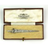 AN EARLY 20TH CENTURY WHITE METAL AND DIAMOND NOVELTY 'DAGGER' BROOCH The single row of graduating