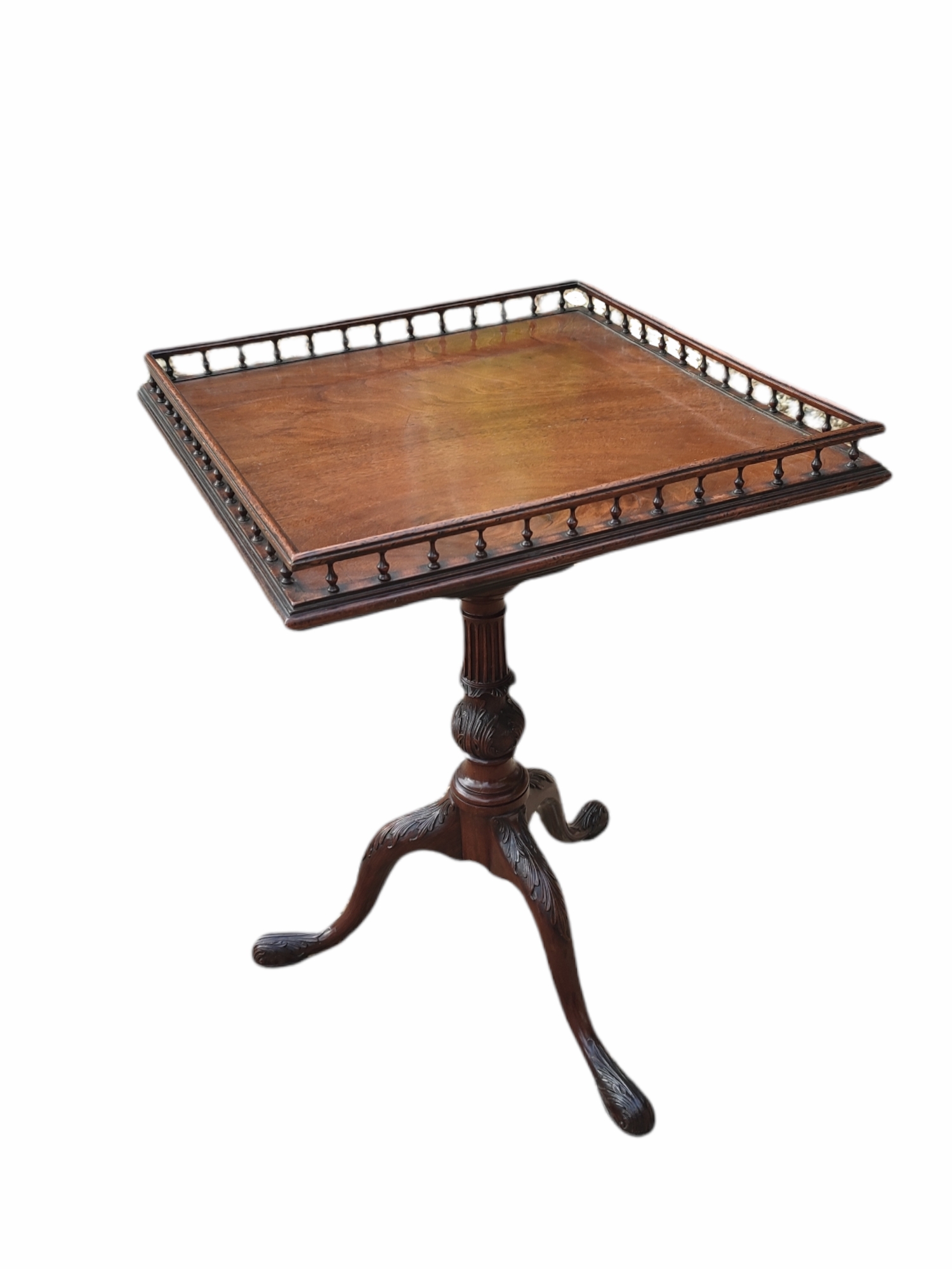 AN 18TH CENTURY MAHOGANY TILT TOP TRIPOD TABLE With square spindles galleried top above a bird cage,