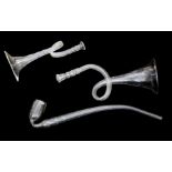 TWO 19TH CENTURY 'FRIGGER' GLASS EAR TRUMPETS Clear glass with spiral twists, together with a