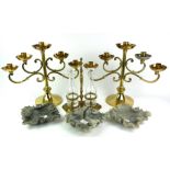 A VINTAGE PAIR OF FIVE BRANCH BRASS CANDELABRA With circular sconces and scrolled arms, together