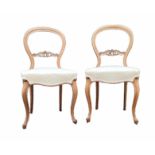 A PAIR OF VICTORIAN BLEACHED MAHOGANY SPOONBACK DINING CHAIRS With beige fabric upholstered