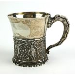 WITHDRAWN!! AN EARLY 20TH CENTURY CONTINENTAL SILVER TANKARD Having a single handle with embossed
