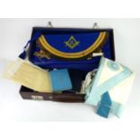 A SET OF MASONS REGALIA In a brown leather case, bearing initials 'JB 770'.