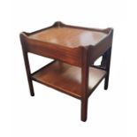 A GEORGIAN STYLE MAHOGANY SIDE TABLE With galleried top above a single drawer with under tier, on