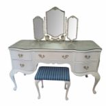 A FRENCH DESIGN LADIES' DRESSING TABLE With freestanding triptych mirror above five drawers, on