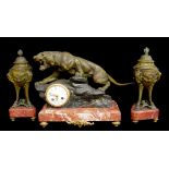 THOMAS FRANÇOIS CARTIER, 1879 - 1943, A FRENCH SPELTER AND MARBLE CLOCK GARNITURE SET The clock