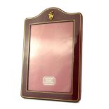 RALPH LAUREN, A NOVELTY 'POLO PLAYER' PHOTOGRAPH FRAME Having burgundy lustre enamel border inlaid