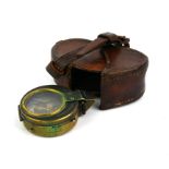 A WWI BRASS MILITARY ISSUE VERNERS SPHERICAL COMPASS With military arrow number '4731915', in a