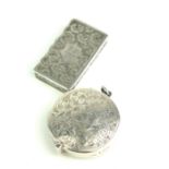 A VICTORIAN SILVER RECTANGULAR PILL BOX With scrolled decoration, hallmarked Birmingham, 1887,