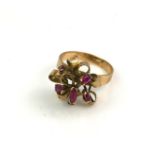 A VINTAGE ORGANIC FORM 14CT GOLD DRESS RING SET WITH RUBIES (size T). Condition: good