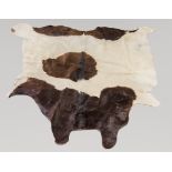 A LATE 20TH CENTURY TAXIDERMY COWHIDE RUG.