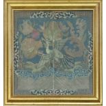 A CHINESE SILK EMBROIDERED PANEL Figured with an exotic bird, framed and glazed, along with a pair