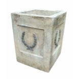 A STONE GARDEN PLINTH Applied with lead wreaths. (34cm x 33cm x 37cm) Condition: good overall