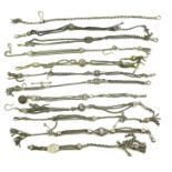 A COLLECTION OF ELEVEN 19TH CENTURY CONTINENTAL WHITE METAL ALBERTINA WATCH CHAINS Having decorative