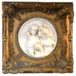 A CONTEMPORARY COMPOSITE MARBLE FIGURAL SPHERICAL PLAQUE, IMAGE OF TWO CHILDREN With inscription