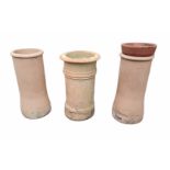 THREE TERRACOTTA CHIMNEY POTS. (largest 79cm) Condition: good overall