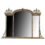 AN EARLY 20TH CENTURY REGENCY STYLE BEVELLED PLATED TRIPTYCH OVER MANTLE MIRROR Gilt framed. (