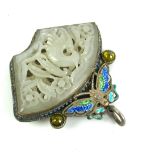 A CHINESE WHITE METAL, JADE AND ENAMEL PENDANT The pierced jade panel carved with exotic birds and