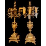 A LARGE PAIR OF 20TH CENTURY CLASSICAL FORM BRASS CANDELABRA Five scrolled branches, on stepped