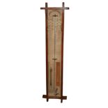 ADMIRAL FITZROY, A LATE 19TH/EARLY 20TH CENTURY OAK RECTANGULAR BAROMETER With glass mercurial