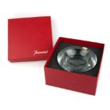 BACCARAT FOR BAUME & MERCIER, A CUT GLASS CIRCULAR ASHTRAY With engraved monogram, fitted in a